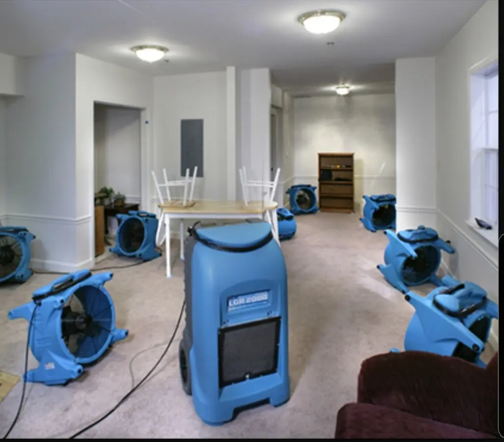 Air movers and dehumidifier setup for Water Extraction & Removal in Lawrence